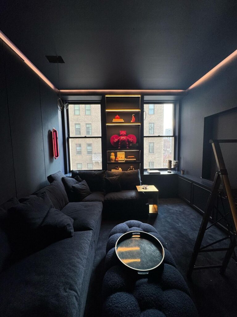 custom millwork navy blue media room shelving and cabinetry